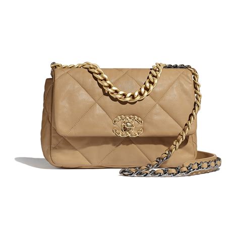 chanel beige medium bag with ruthenium metal black hardware|chanel bags with gold hardware.